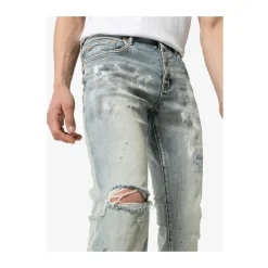 Białe pomalowane jeansy slim fit