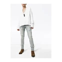 Białe pomalowane jeansy slim fit