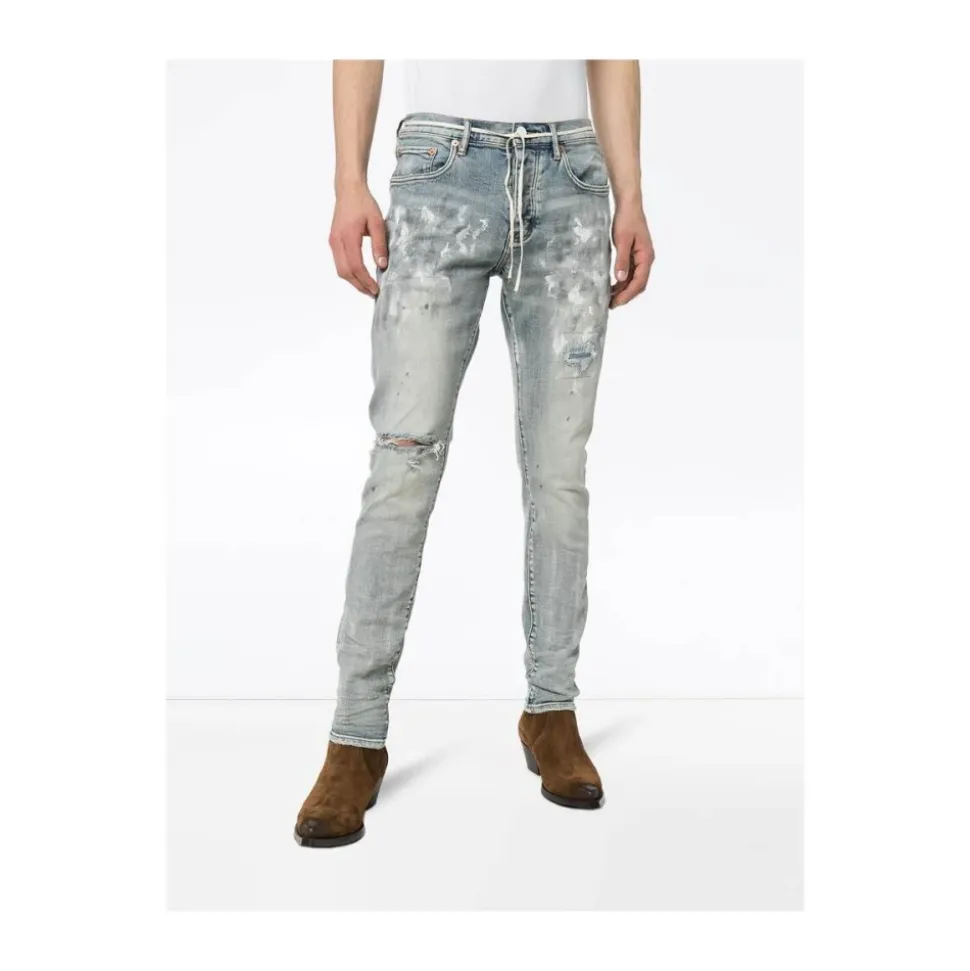 Białe pomalowane jeansy slim fit