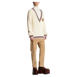 Dzianinowy sweter z naszywką